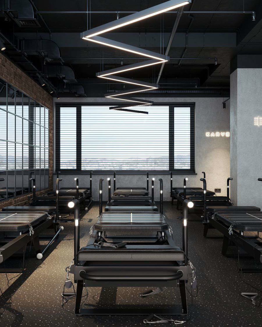KARVE studio floor with mirrored walls and Transformer machines